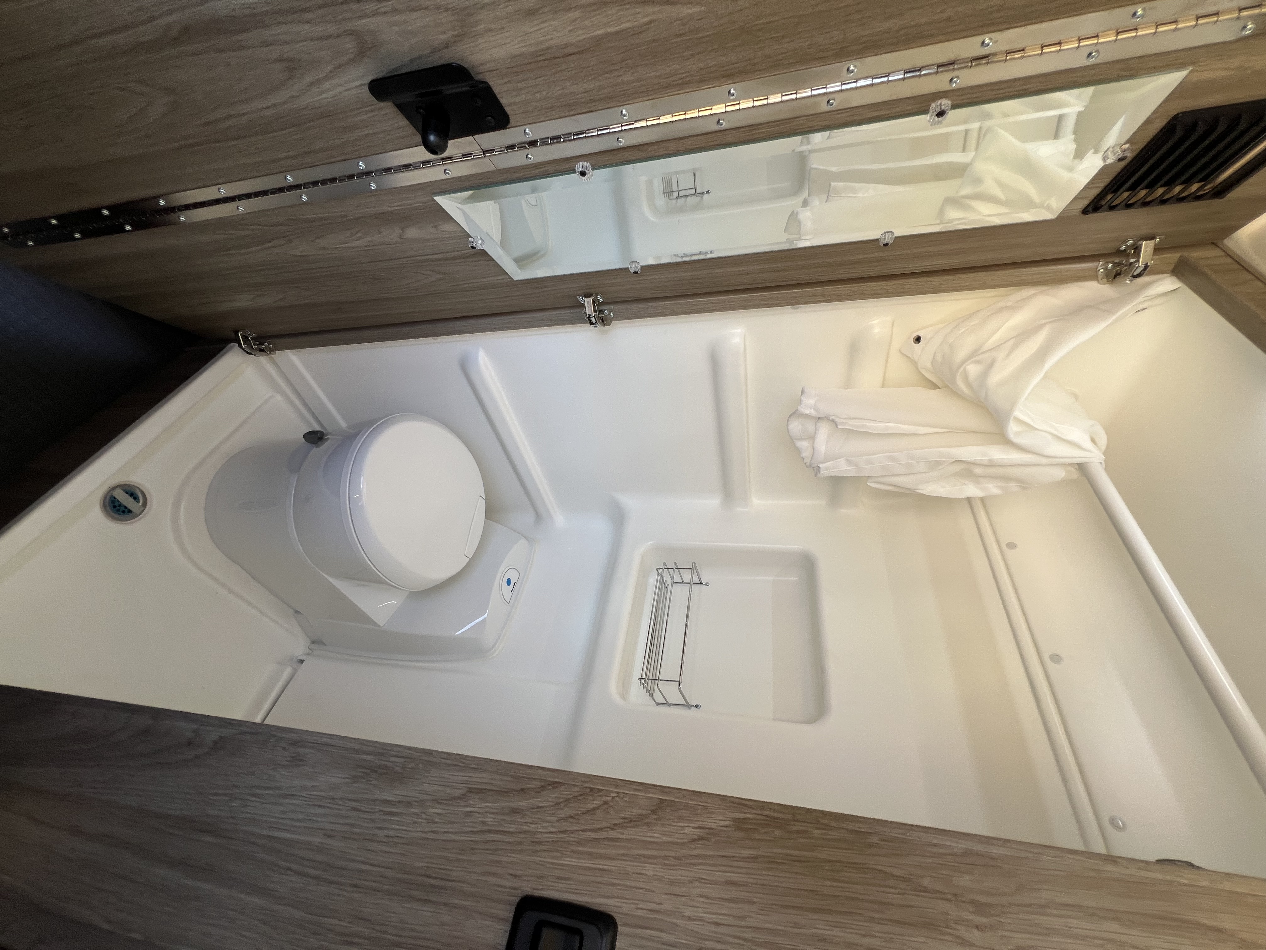 Outdoor kitchen area of the Nomadaya van with equipment